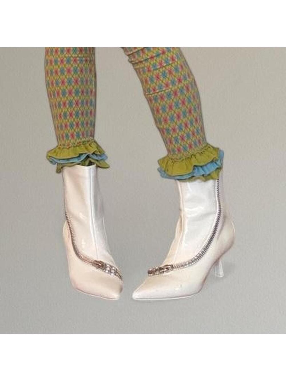 White patent mid calf boots from Circus.